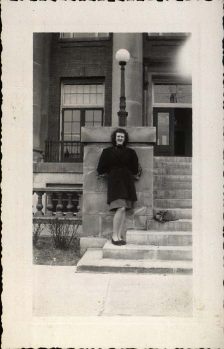 Photograph, Irene Conole leaning against building