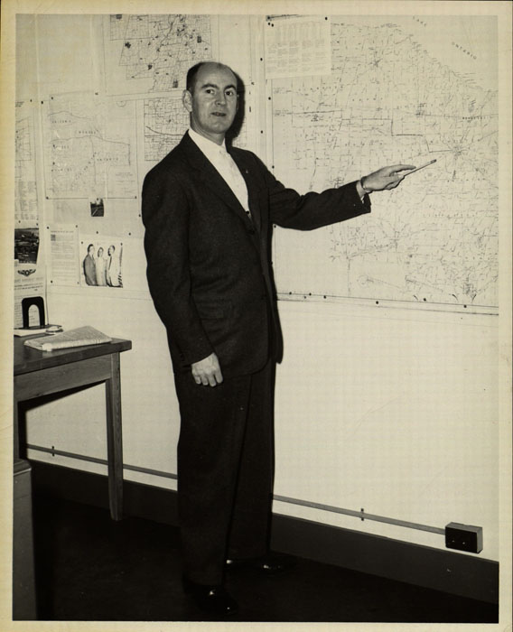 Photograph, Robert Abbott with map