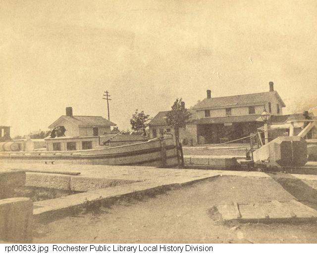 Photograph, canal boat going through a lock